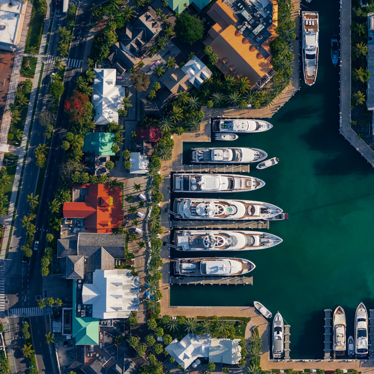 Turquoise marina surrounded by yachts