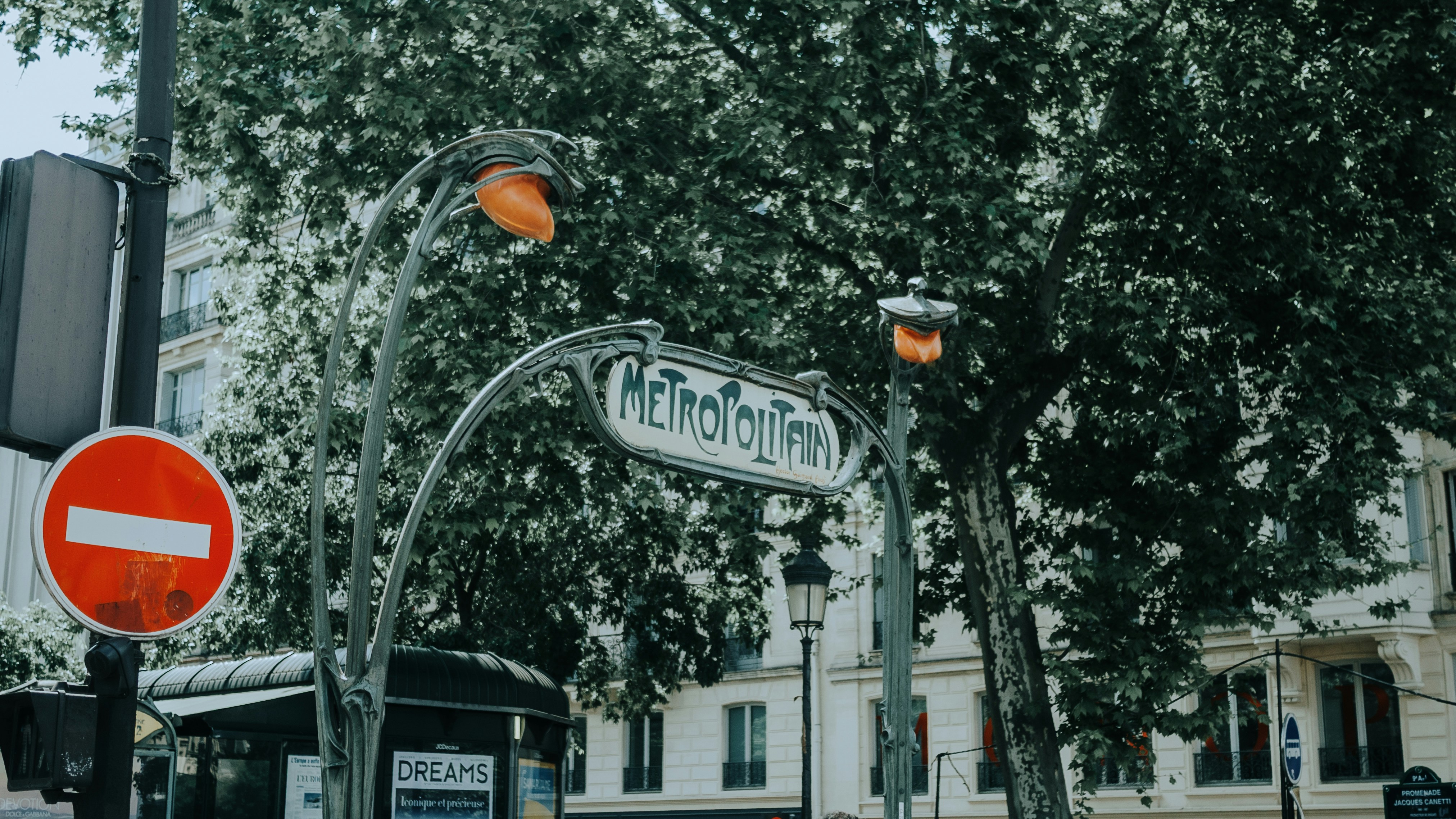 Parisian metro station with signage.