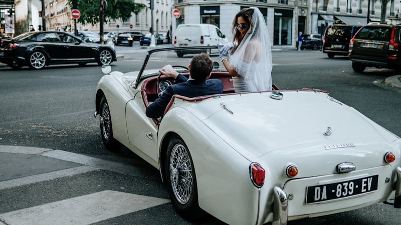 Elegant couple in classic car