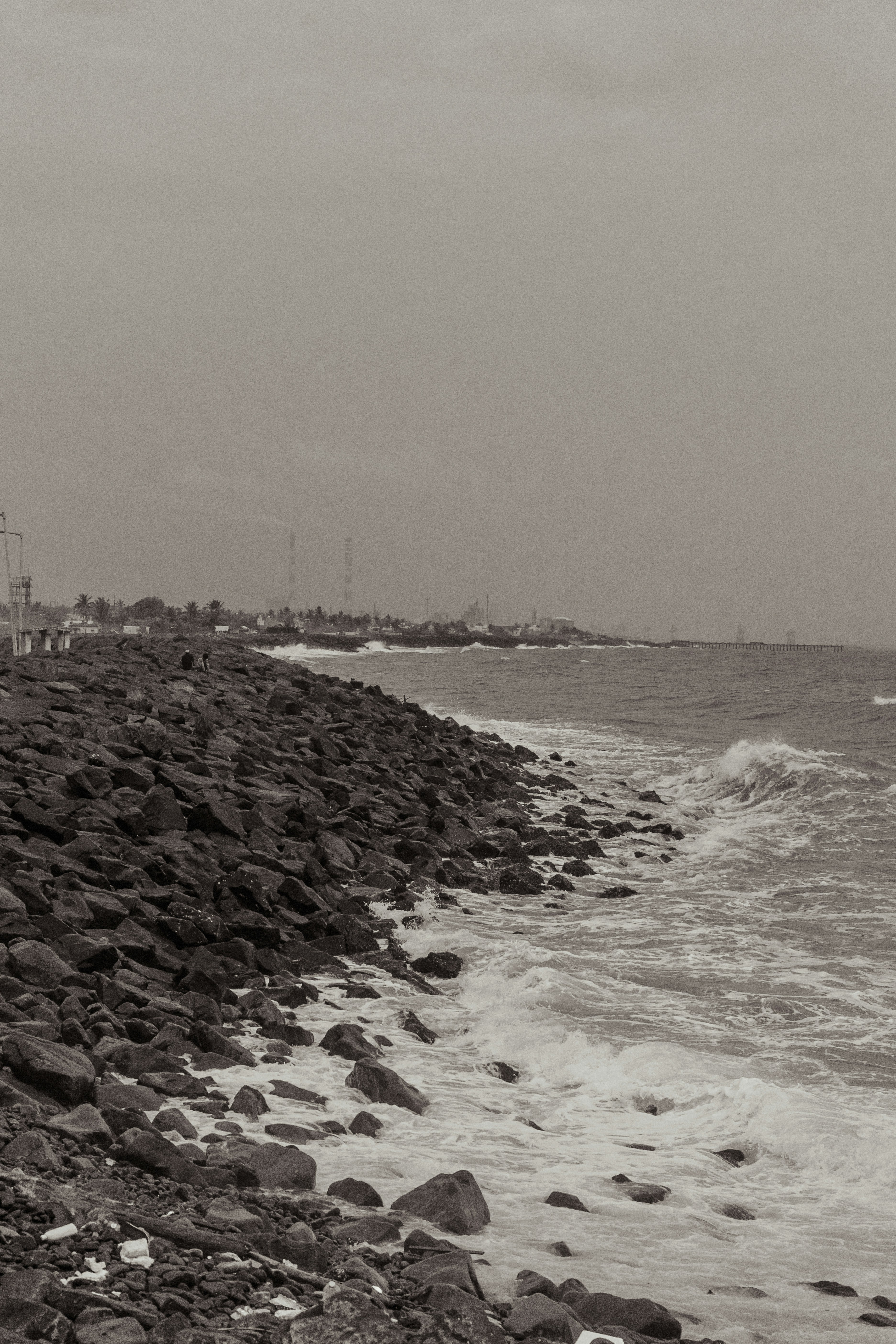 Rocky shoreline meets the ocean waves.