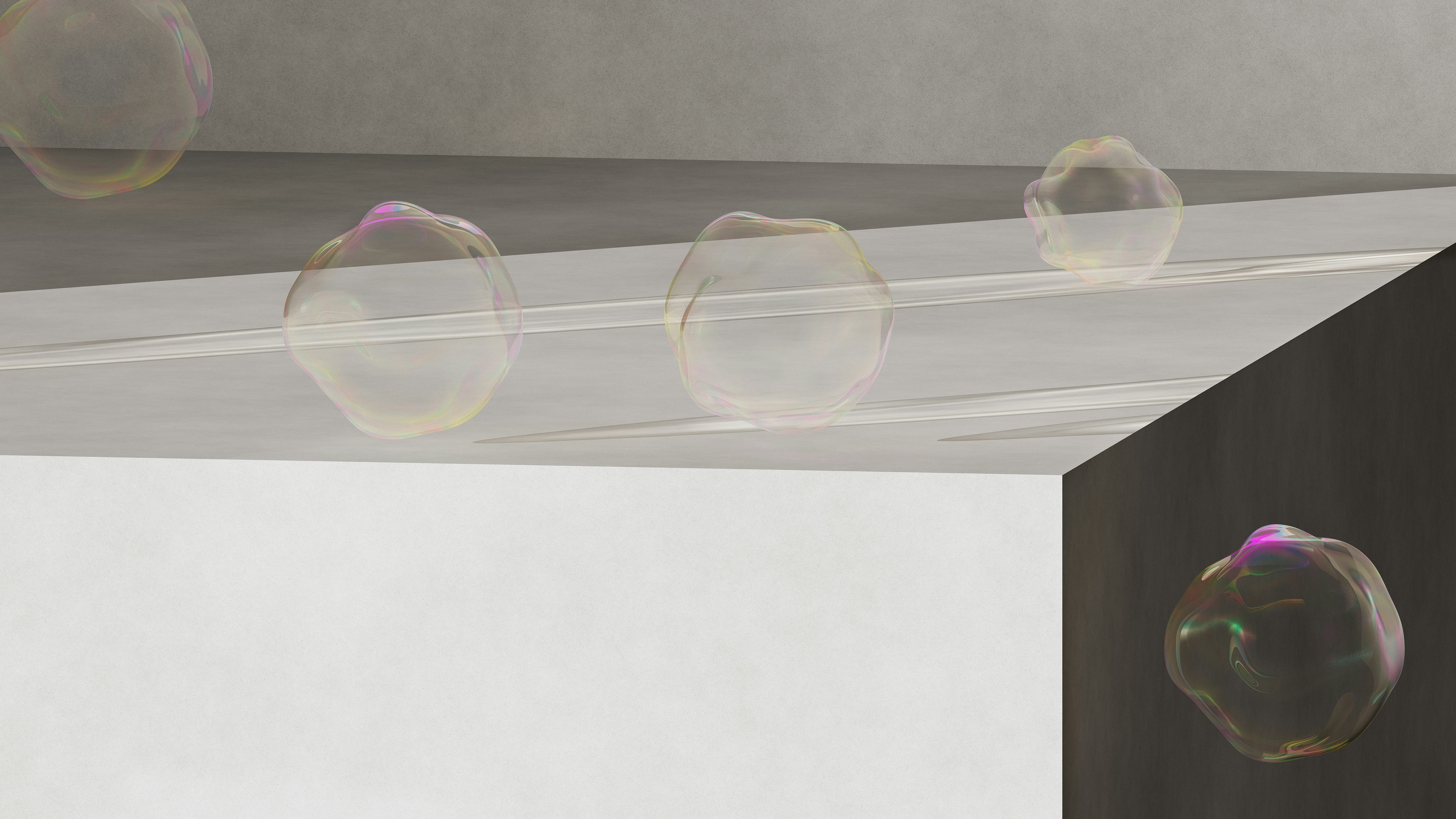 Bubbles float on a reflective surface.