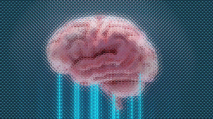 A brain displayed with glowing blue lines