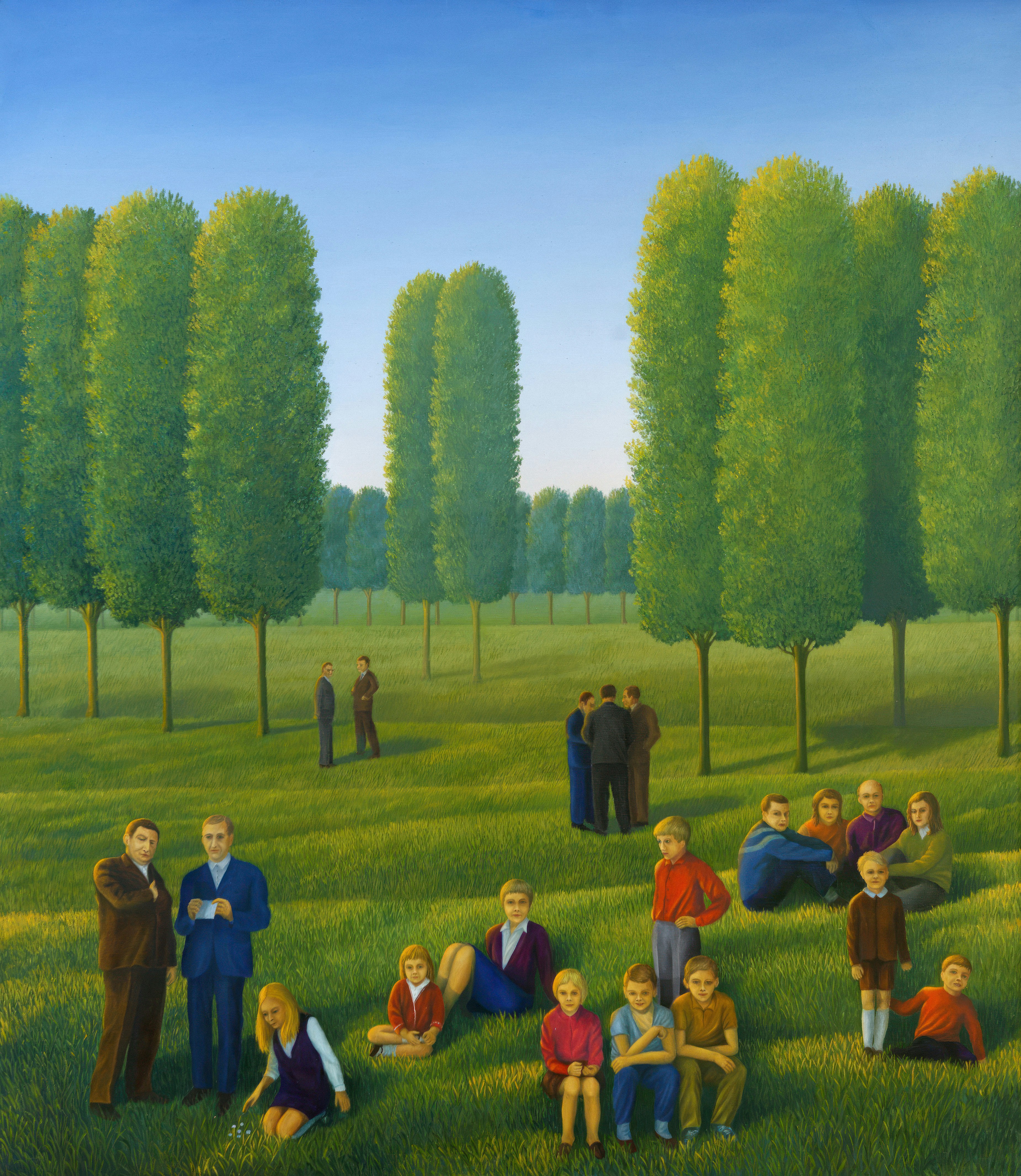 People gathered in a park with tall trees