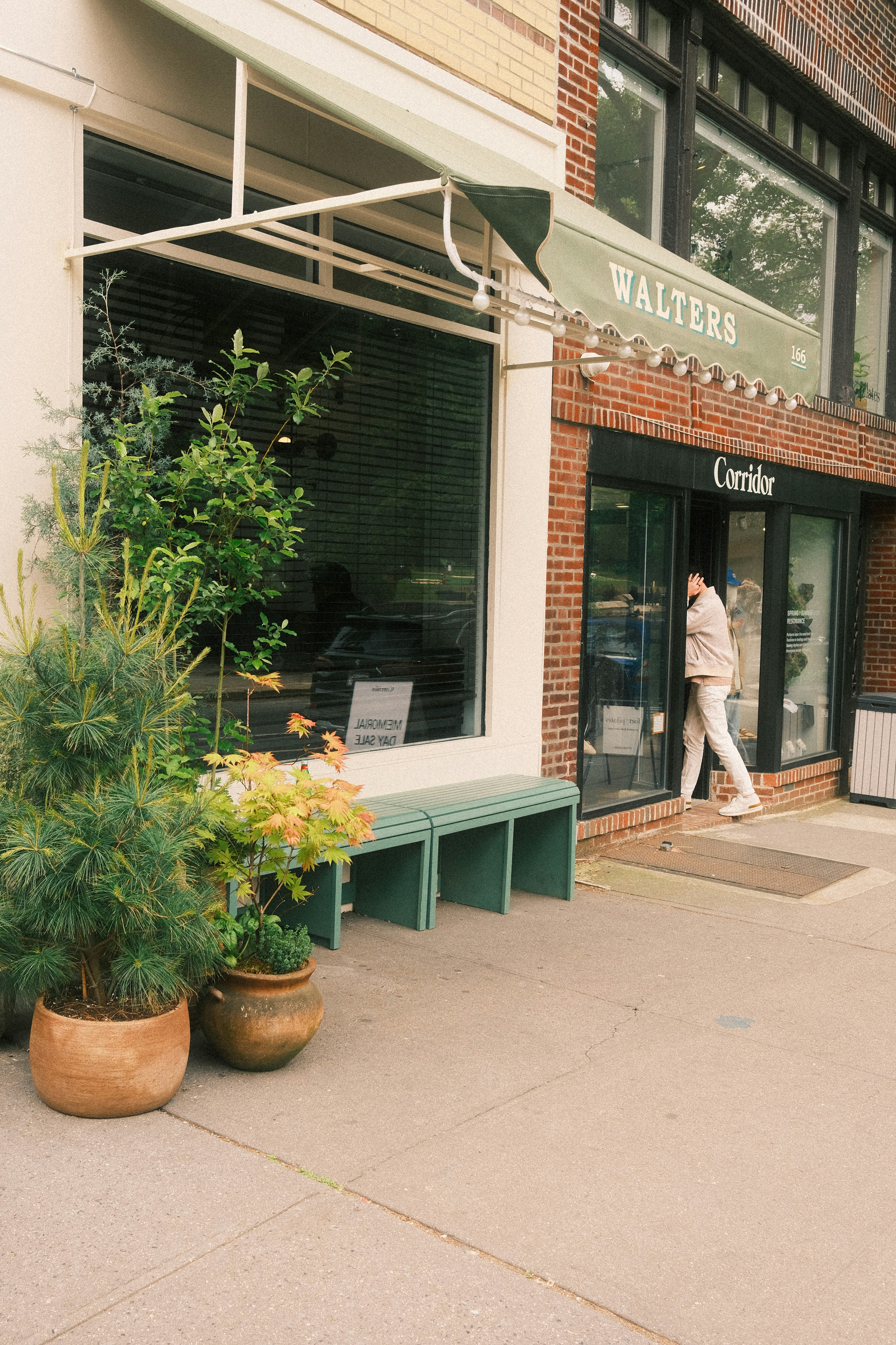 A person enters a storefront called 