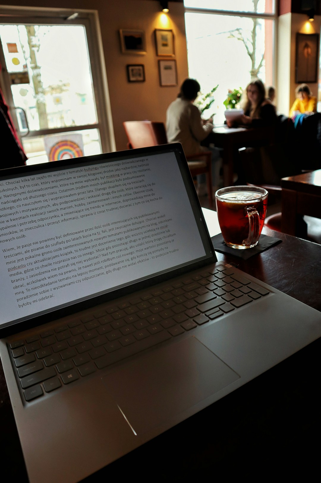 blog writer creating content on laptop