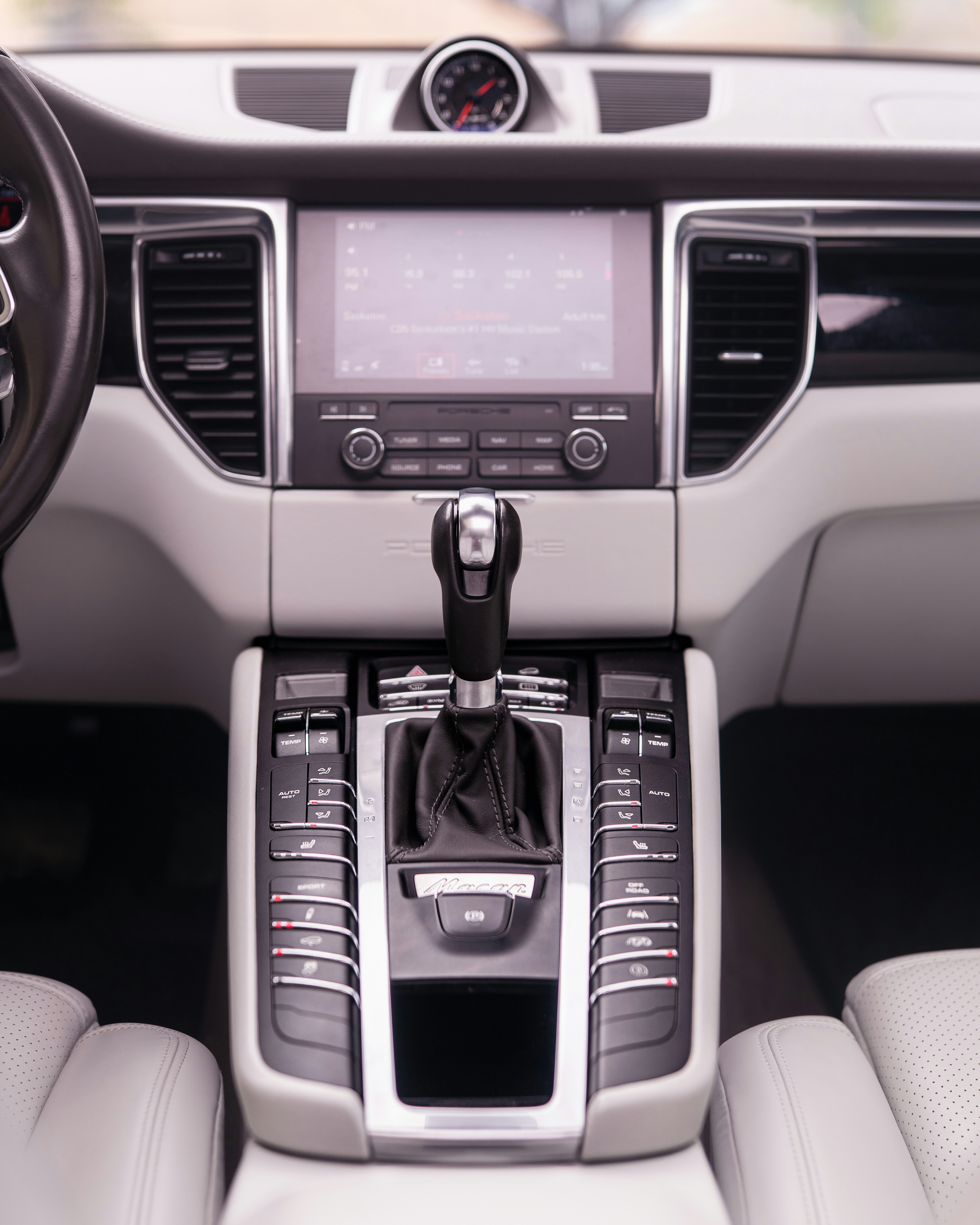 Interior view of a luxury car's dashboard.