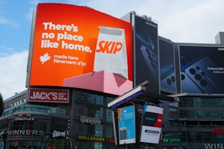 A billboard advertises for skip the dishes.