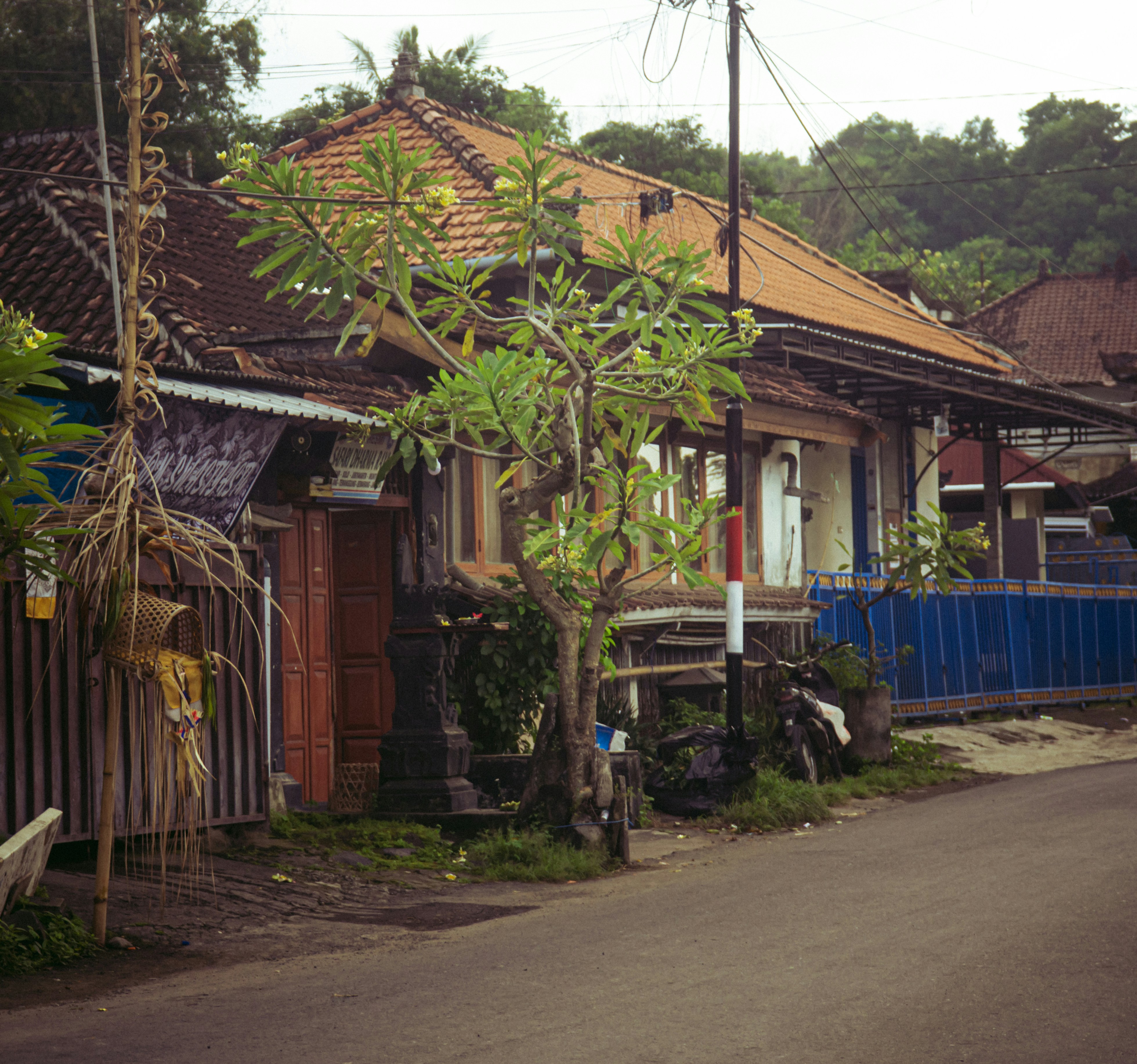 A quaint street scene with colorful houses.