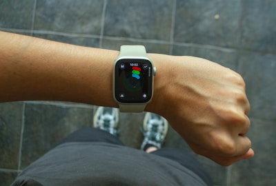 A wrist with an apple watch.