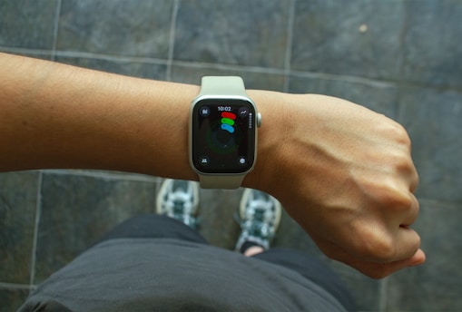 A wrist with an apple watch.