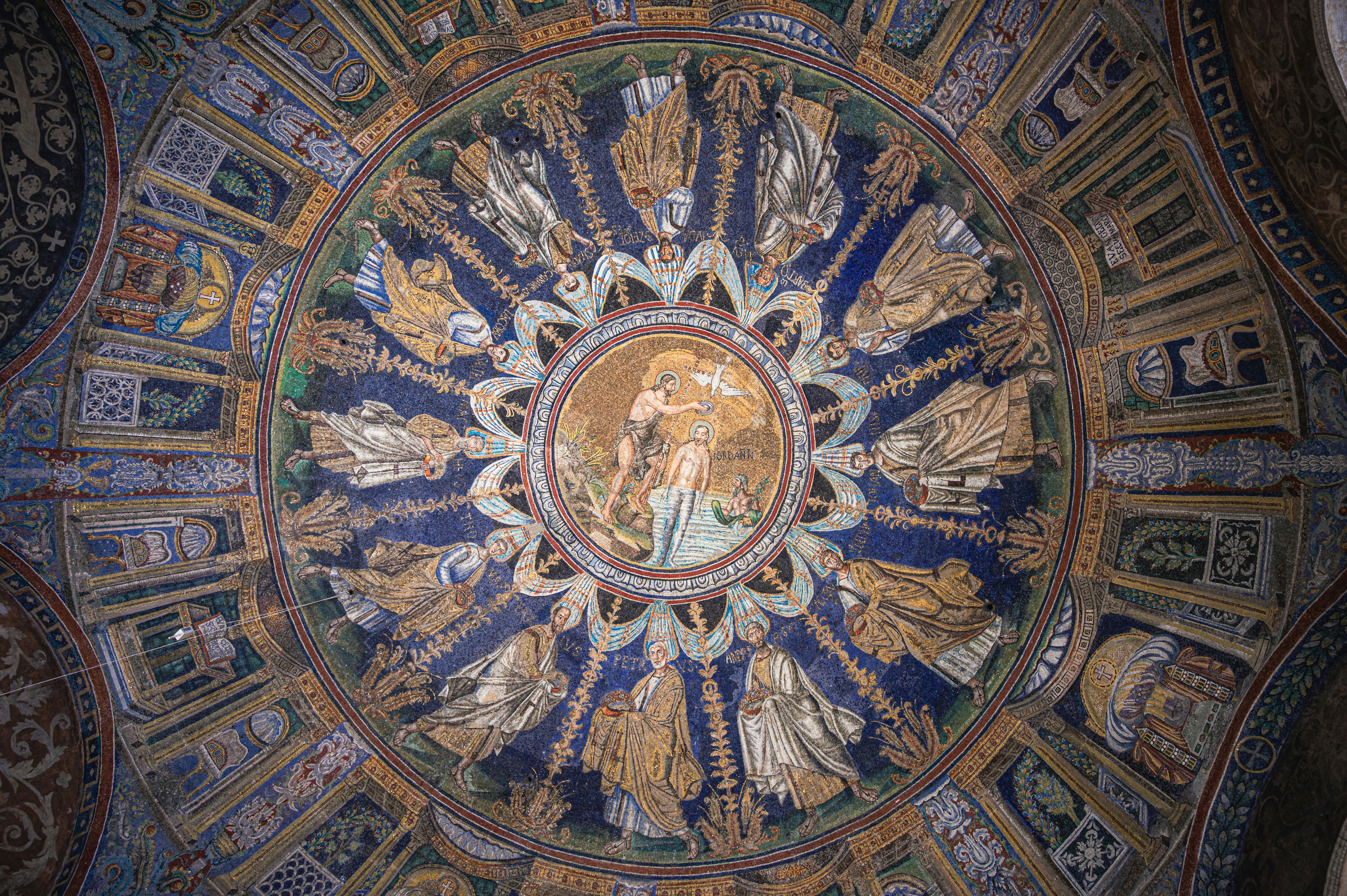 A mosaic dome, depicting figures in a circle.