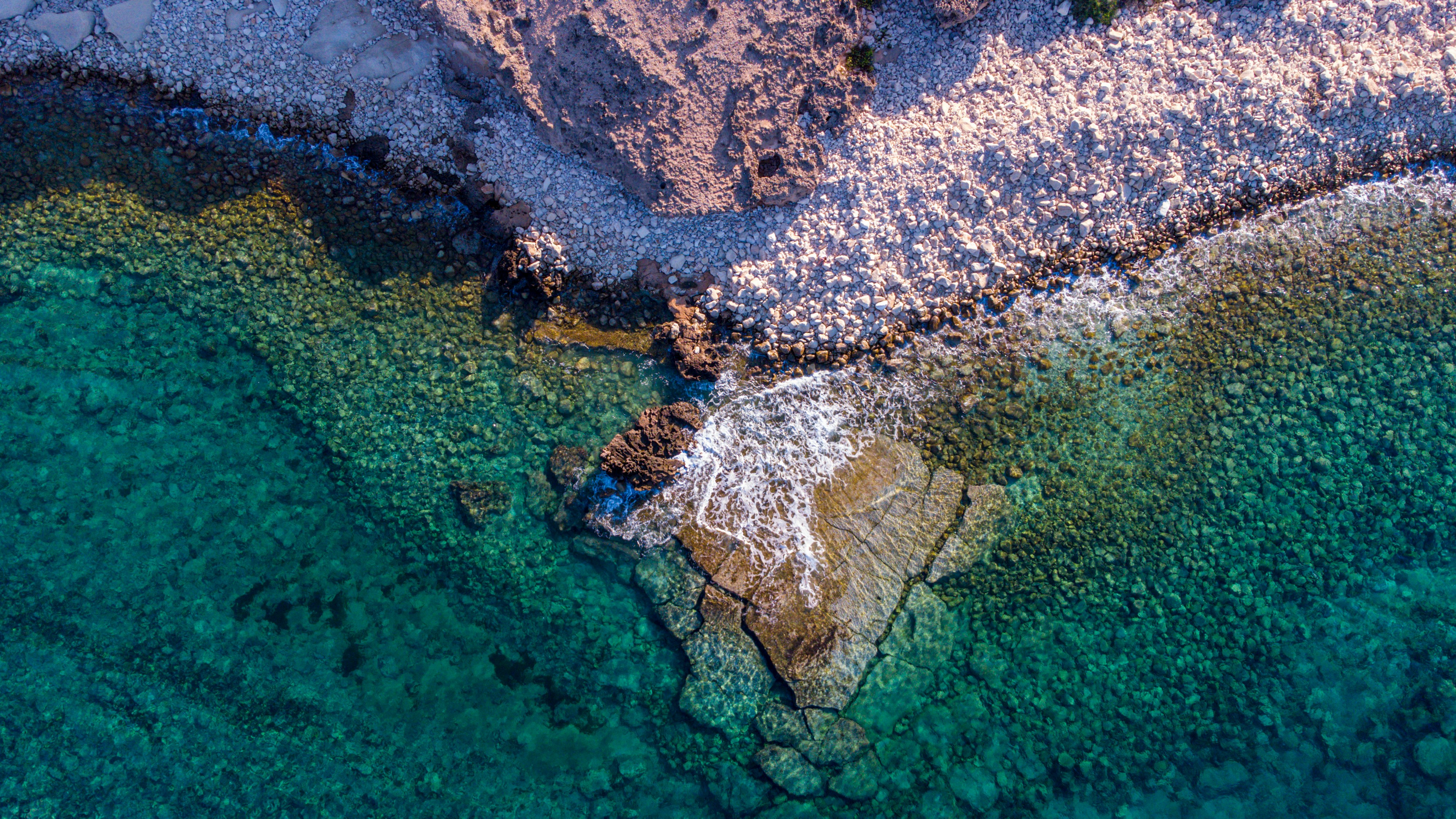 An aerial view of the rocky shoreline.