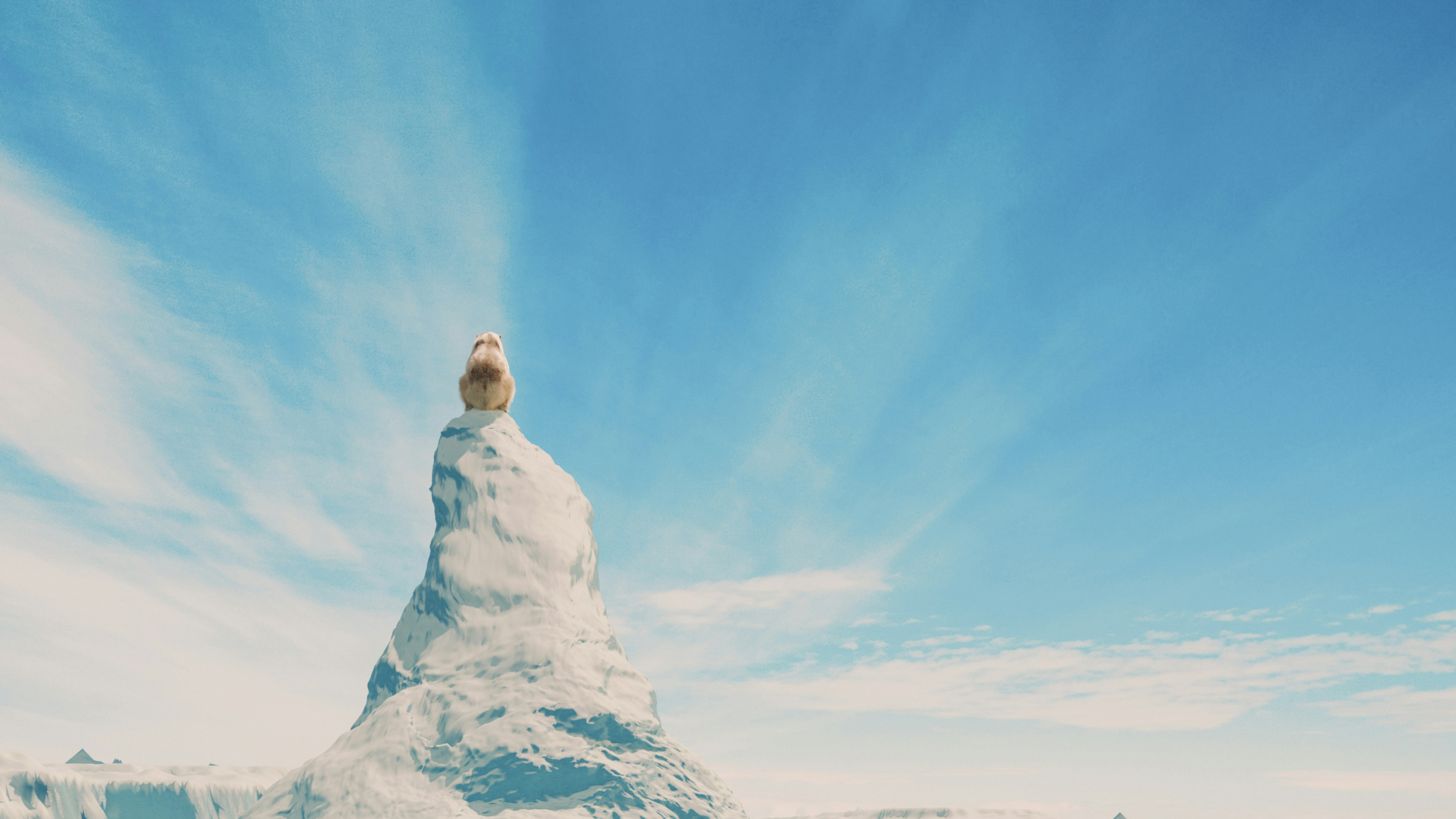 A lemur sits atop an ice rock.