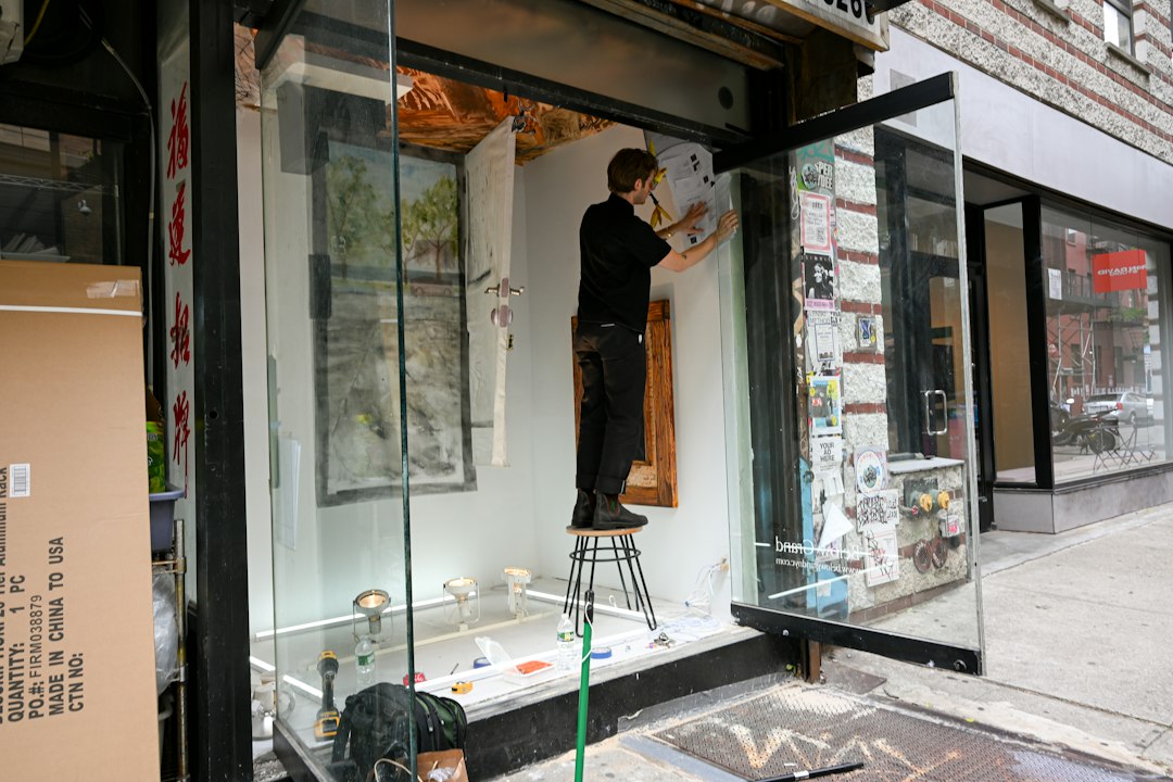 professional installing window tint