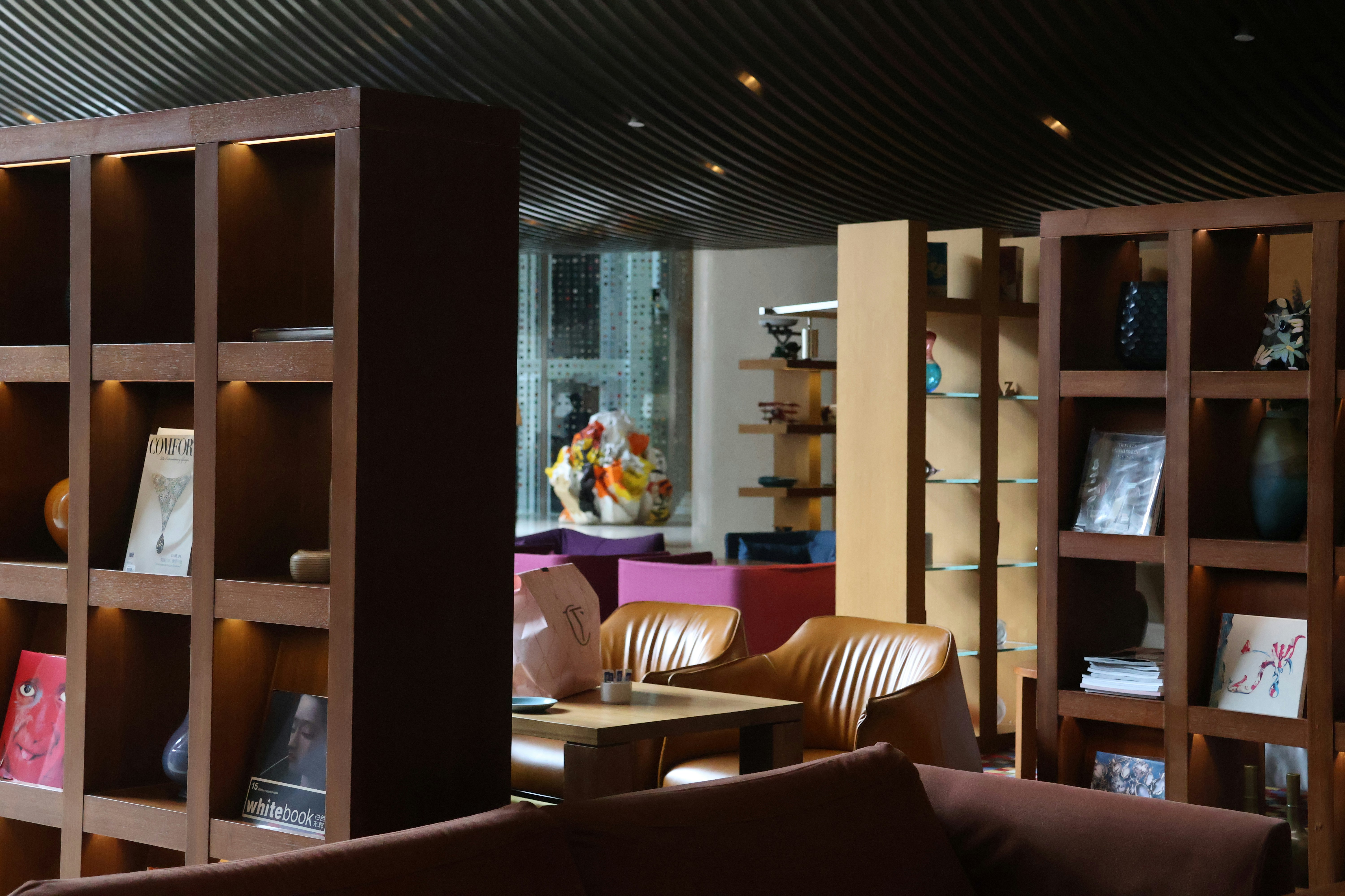 A cozy lounge area with built-in shelving