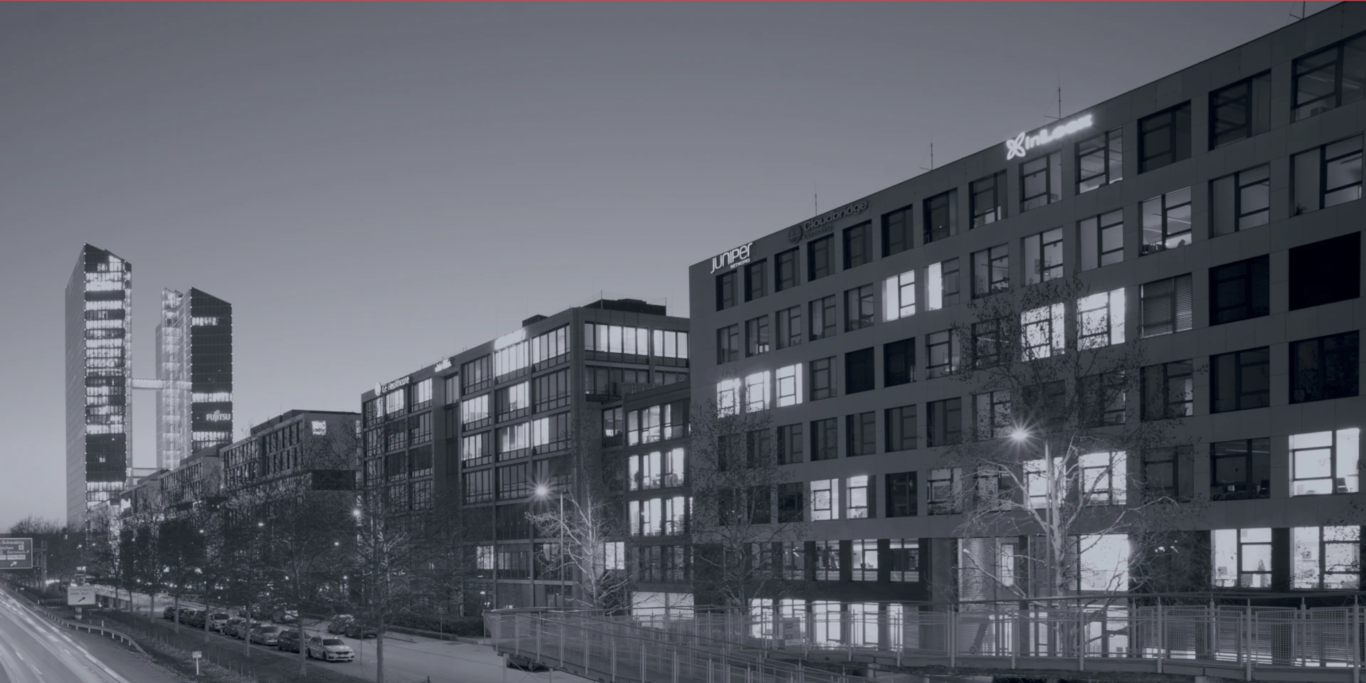 Cityscape of buildings at dusk.