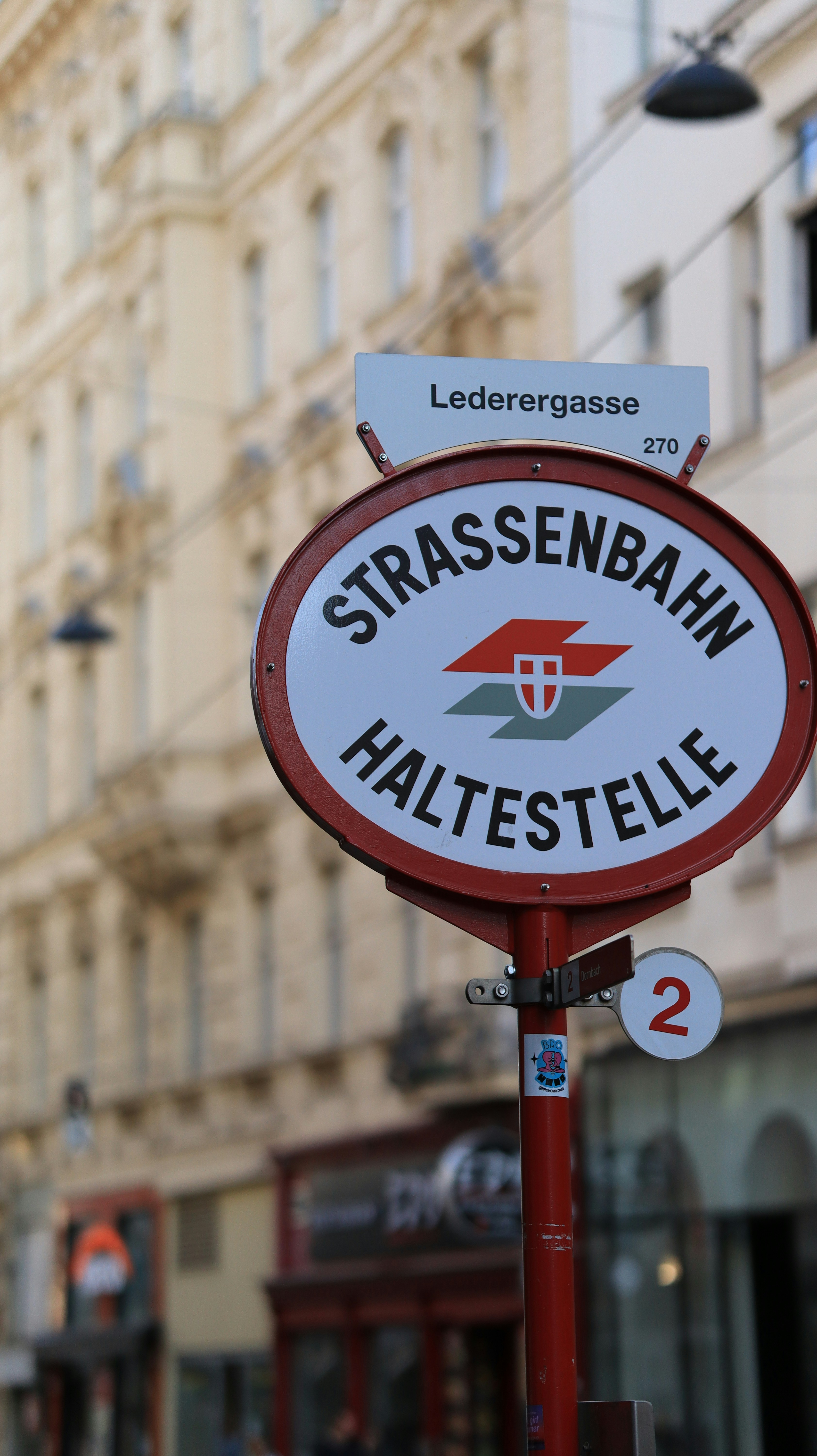 Streetcar stop sign in vienna, austria.