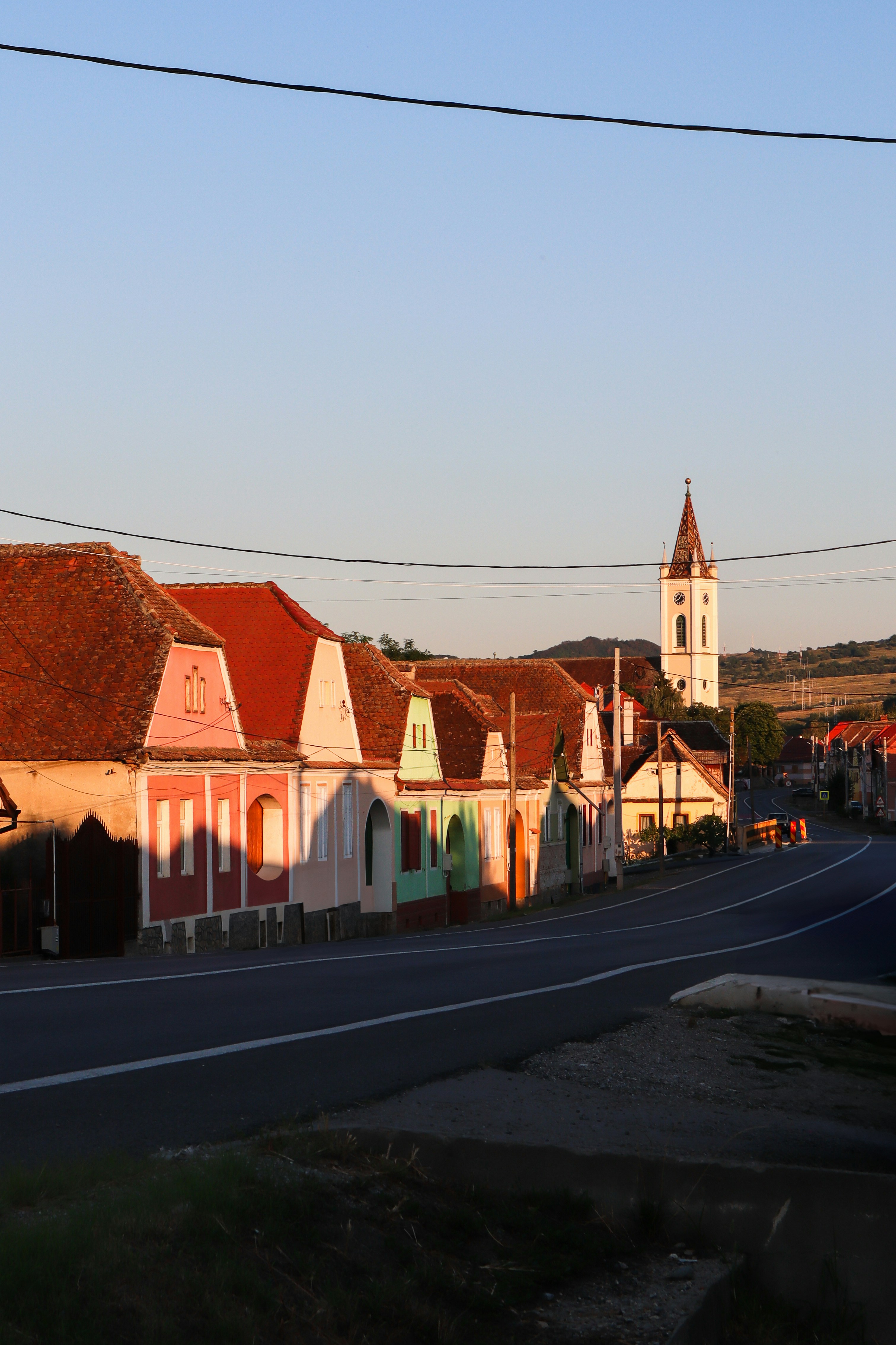 A scenic view of a village with colorful houses.