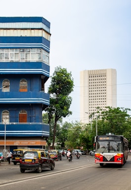 City street with buildings and traffic.