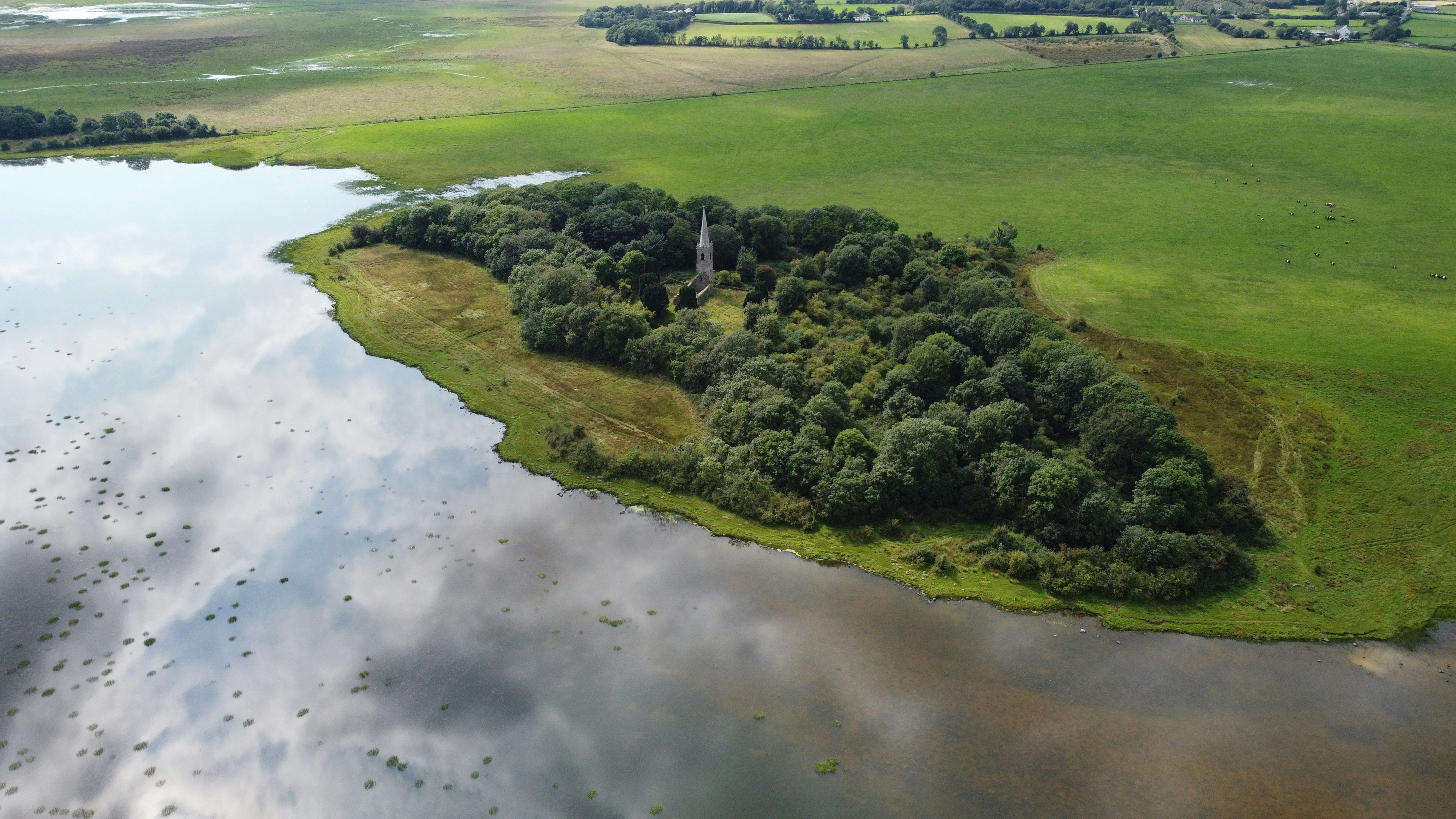 Aerial view of an island in a lake.