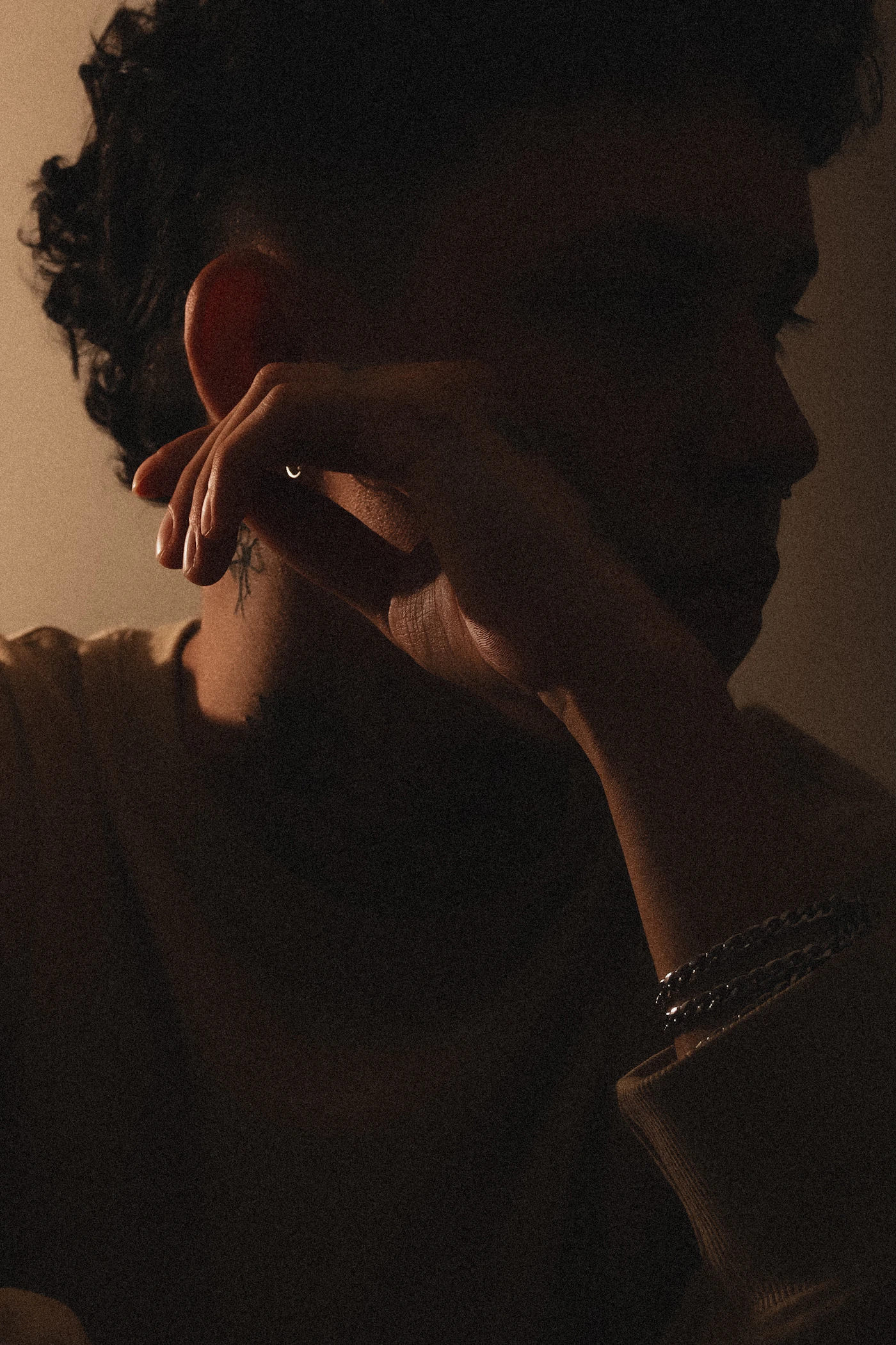 Portrait under dramatic cinematic lighting demonstrating professional color grading
