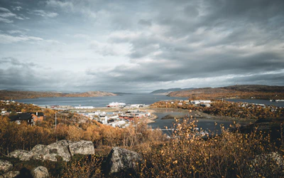 Kirkenes and its harbour under a heavy autumn sky — Finnmark, Norway
