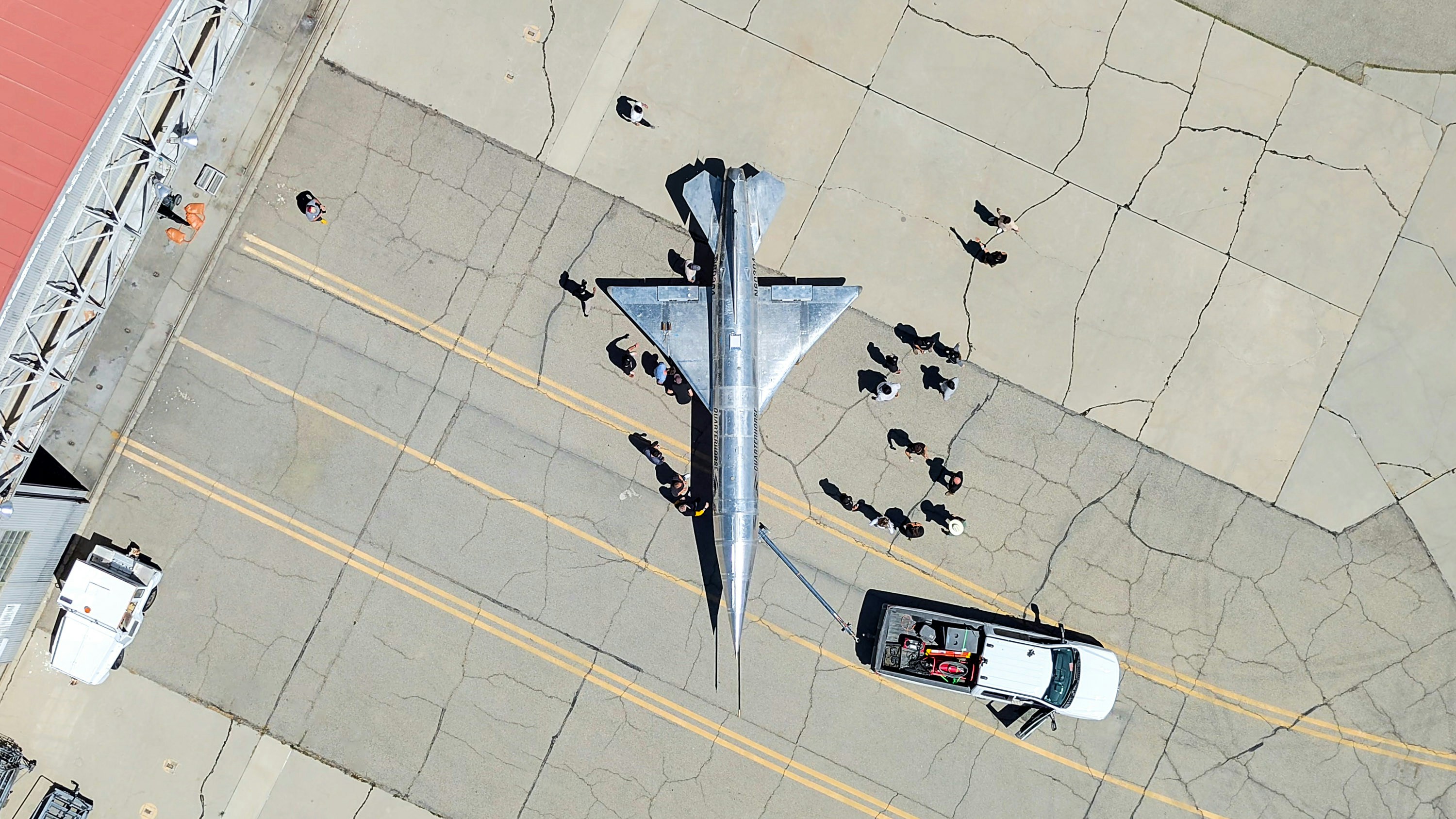 An airplane sits on the airport runway.