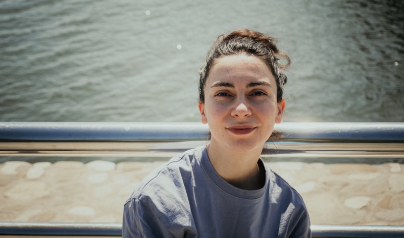 Radiant smile with ocean backdrop
