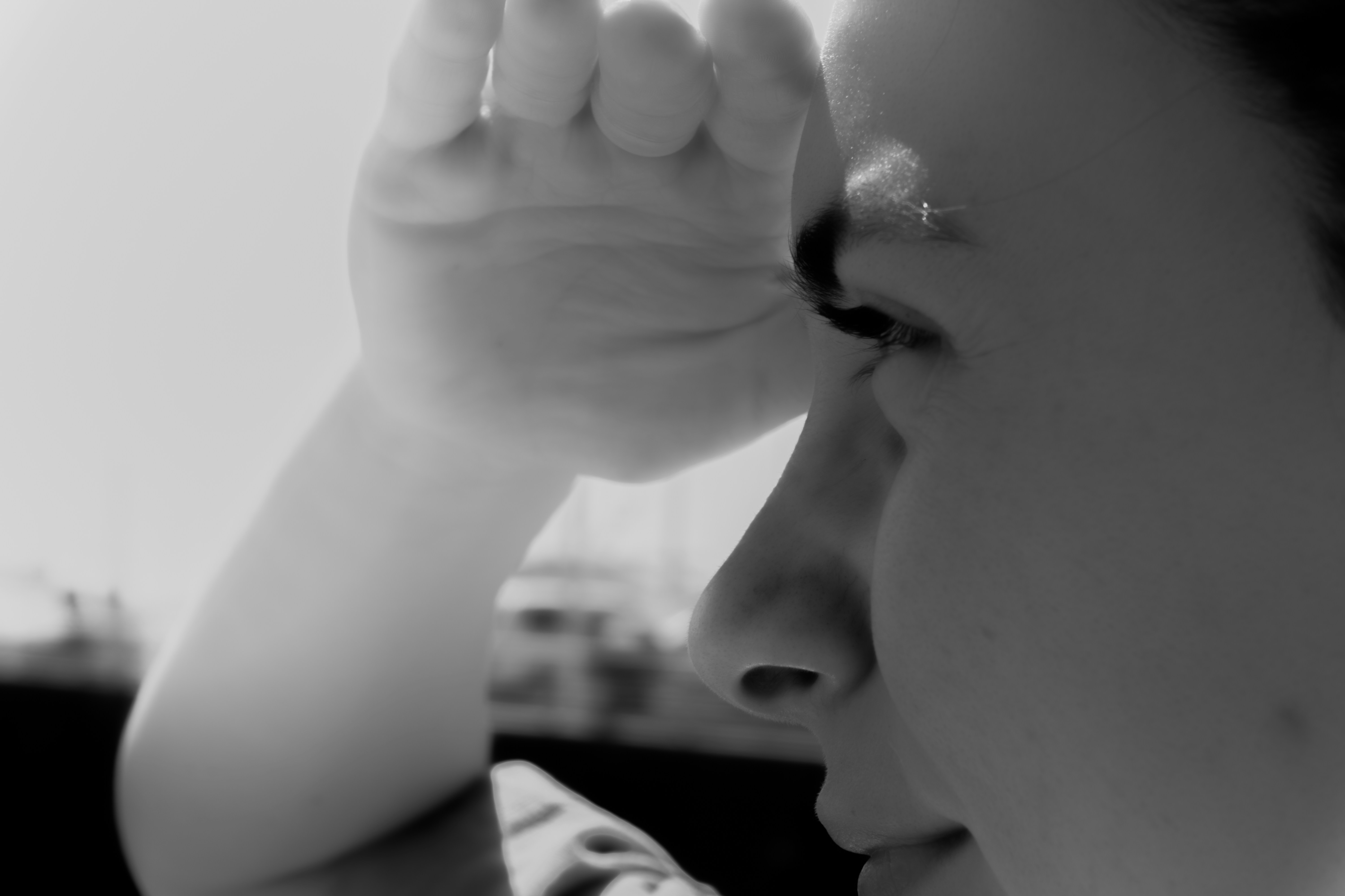 Relaxed person covering eyes