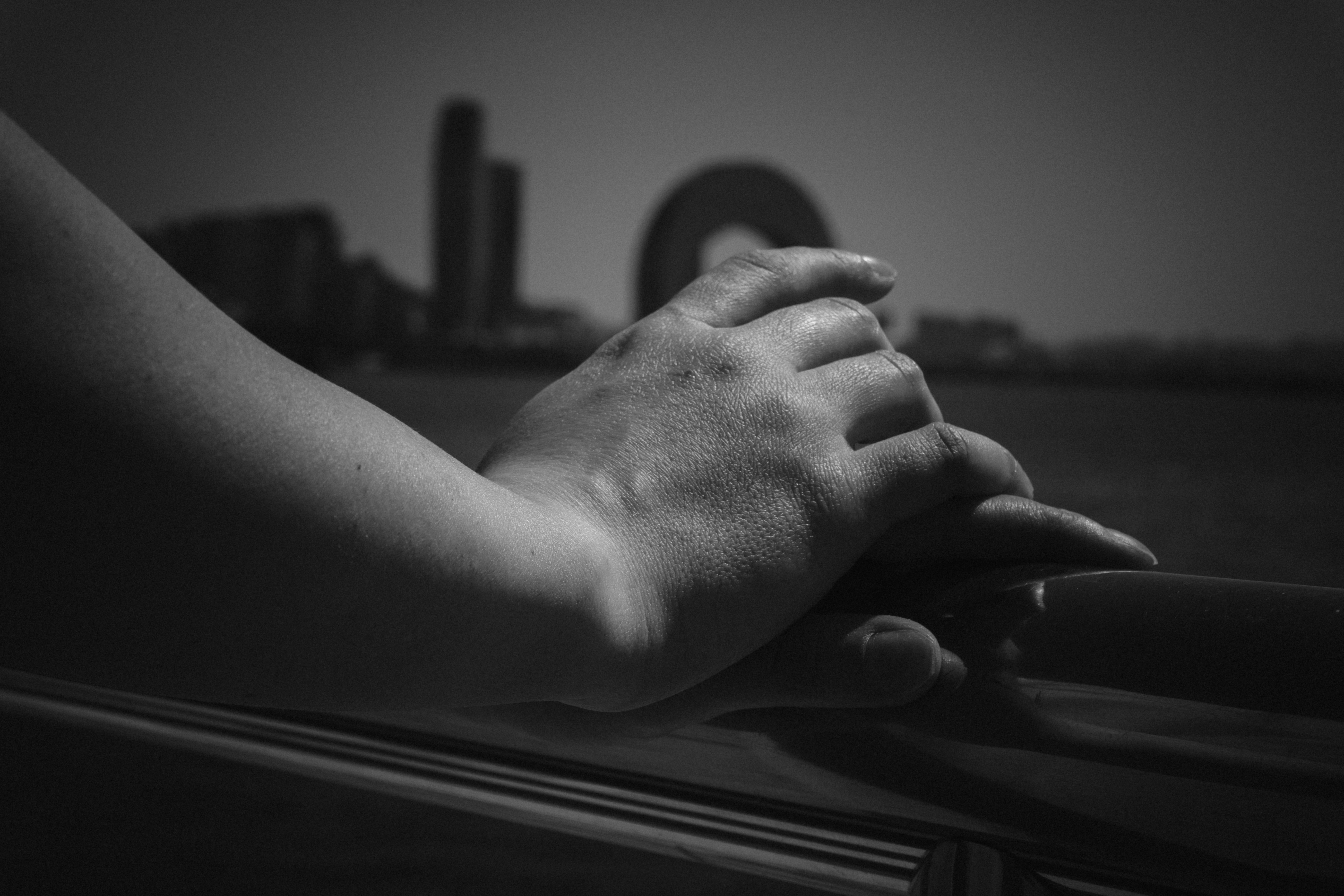 Hands holding together