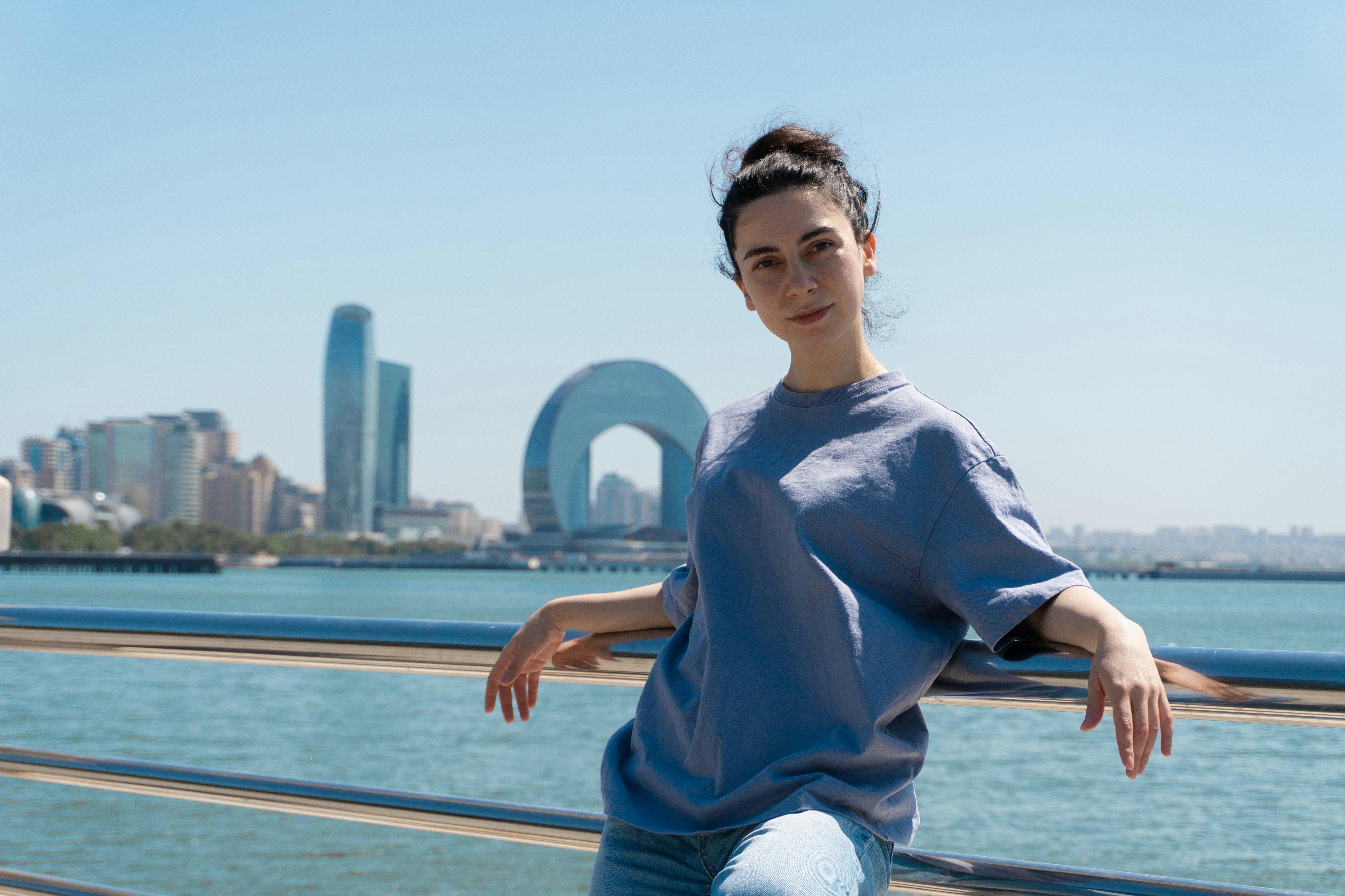 Woman with coastal backdrop