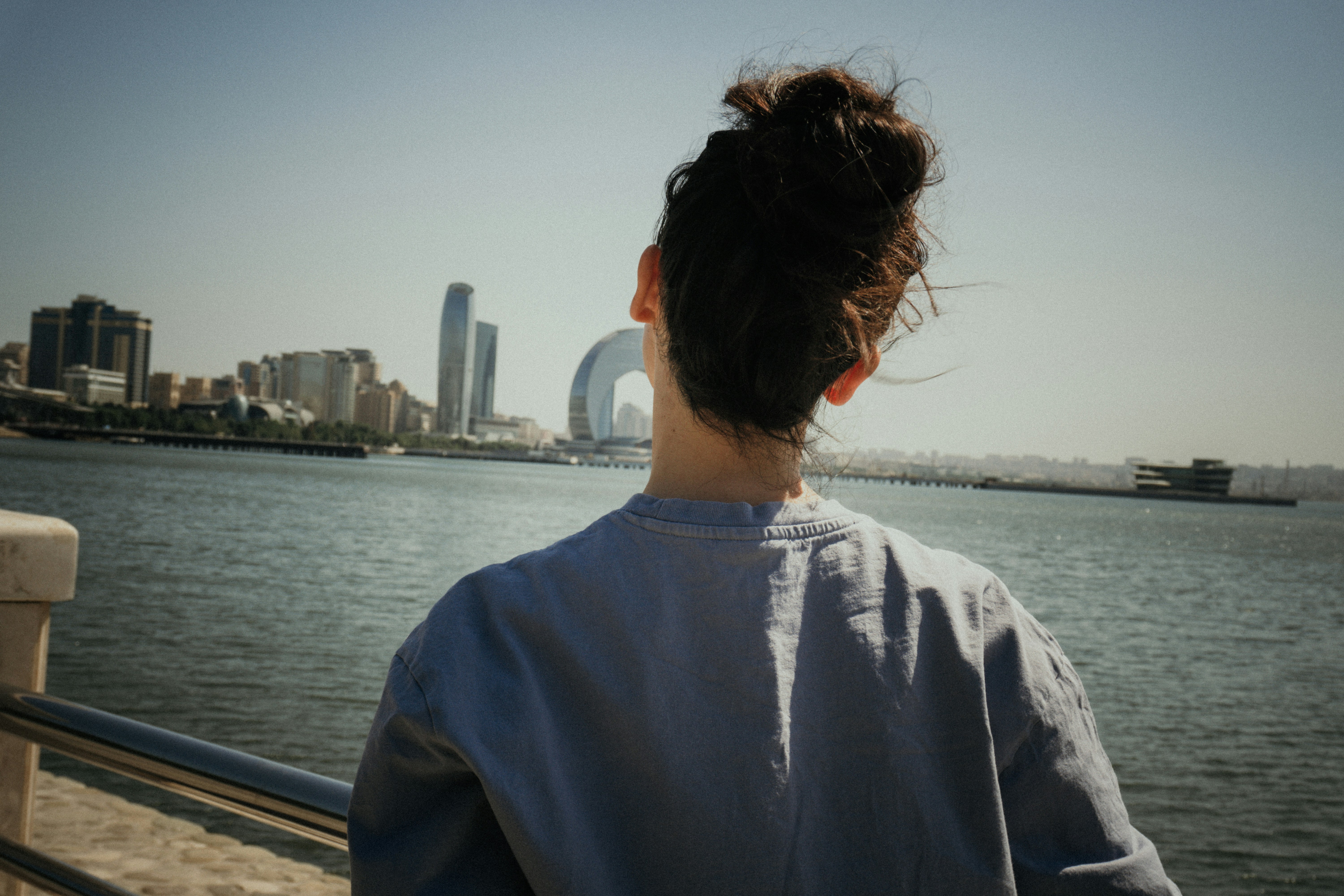 Woman looking at city skyline