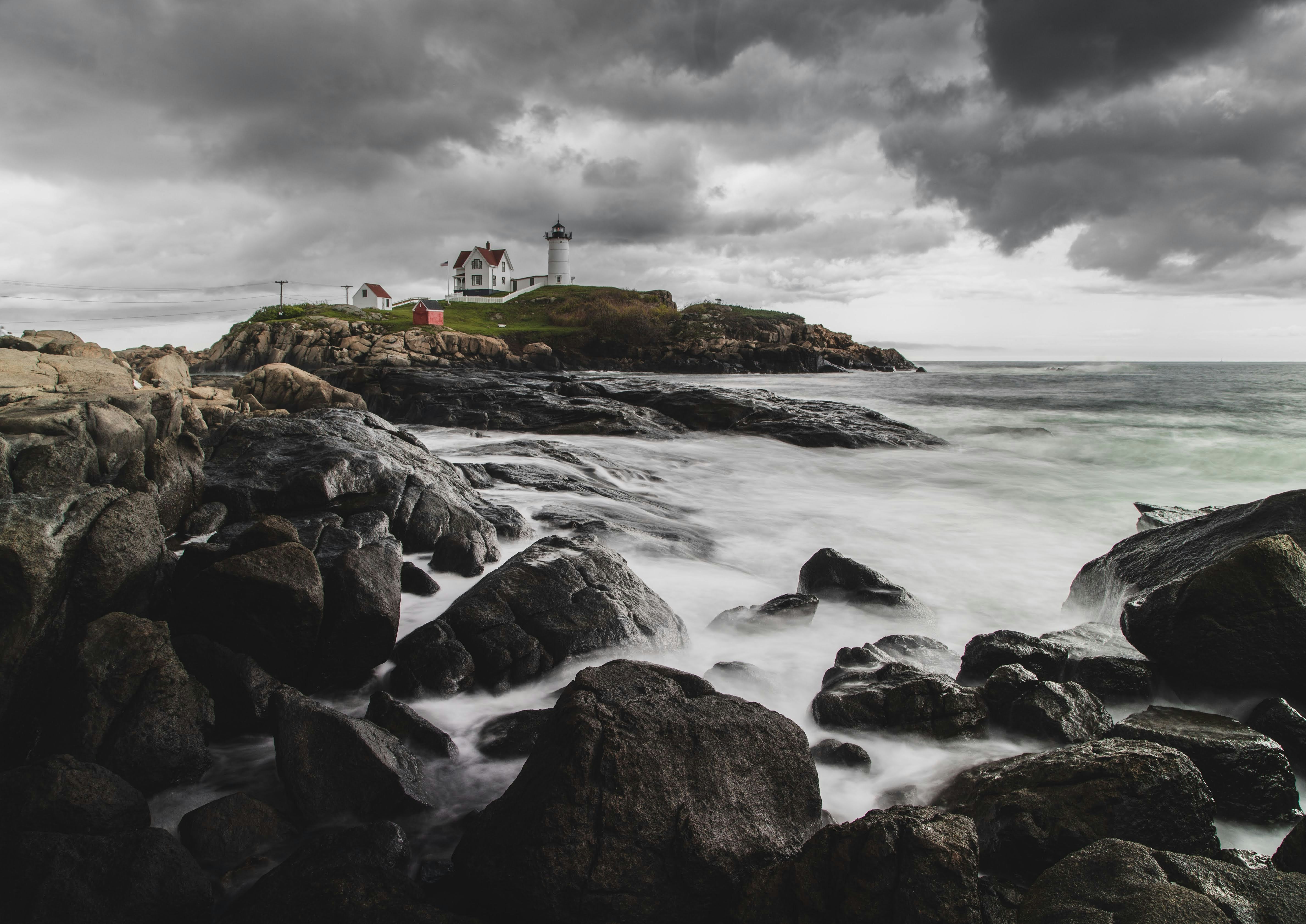 A lighthouse stands guard over the ocean.