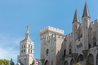 Architectural details of a grand, historic building stand tall.