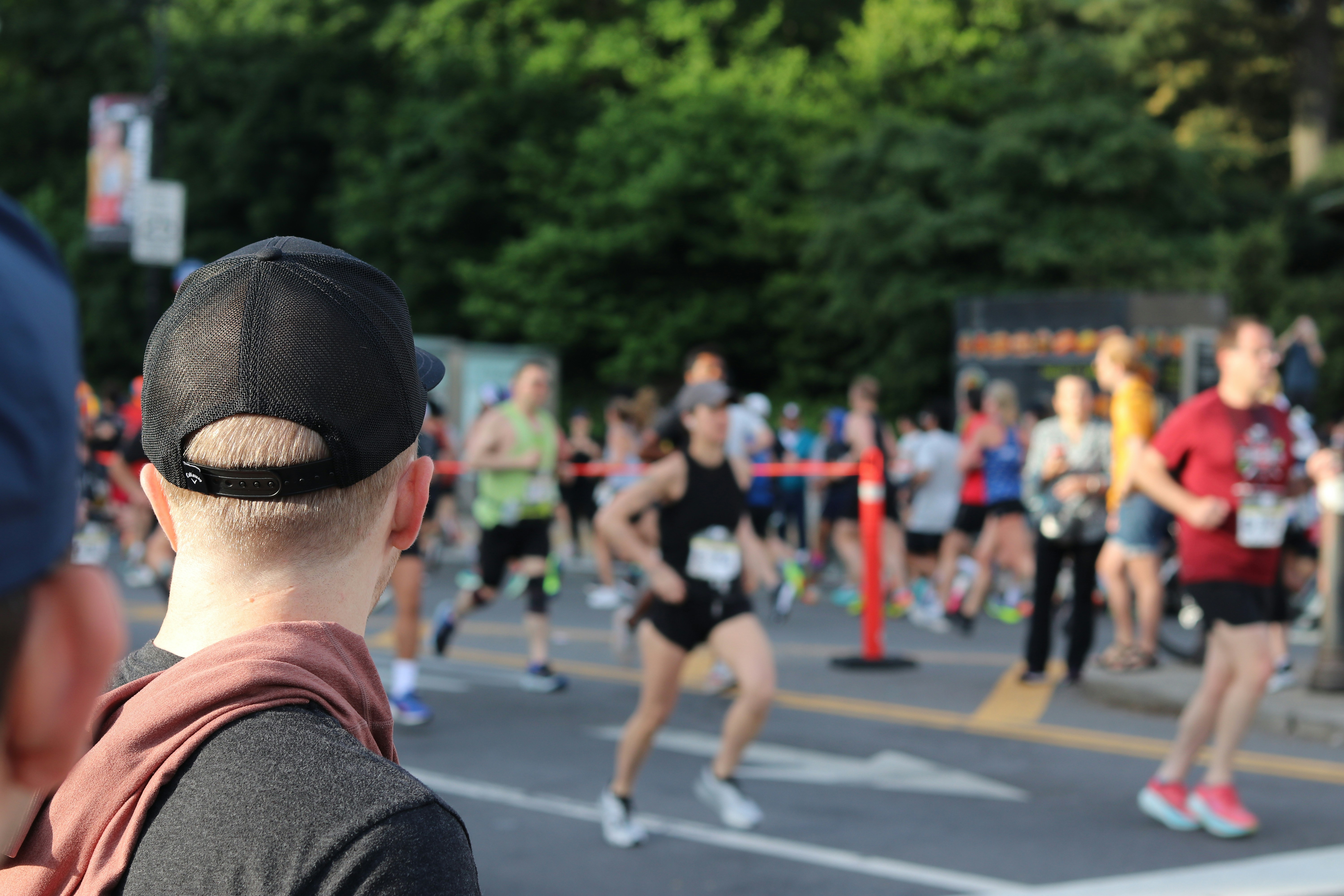 Spectator watching runners