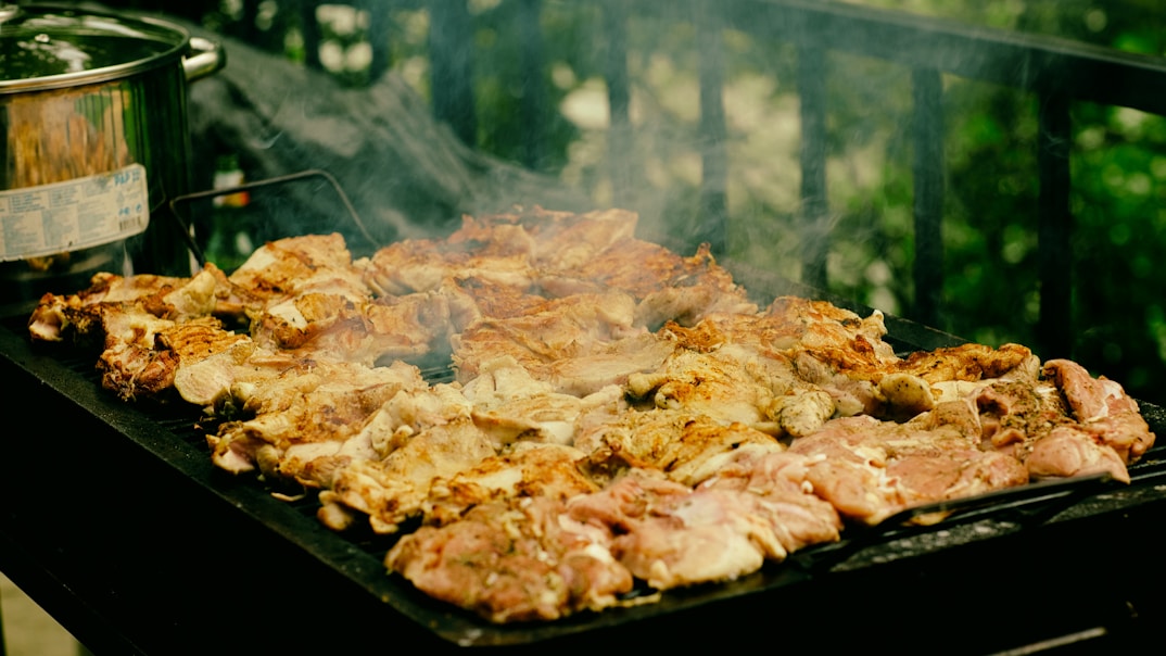 Meat is grilling on the barbecue.