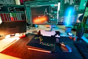 A trader's desk is lit up with charts.