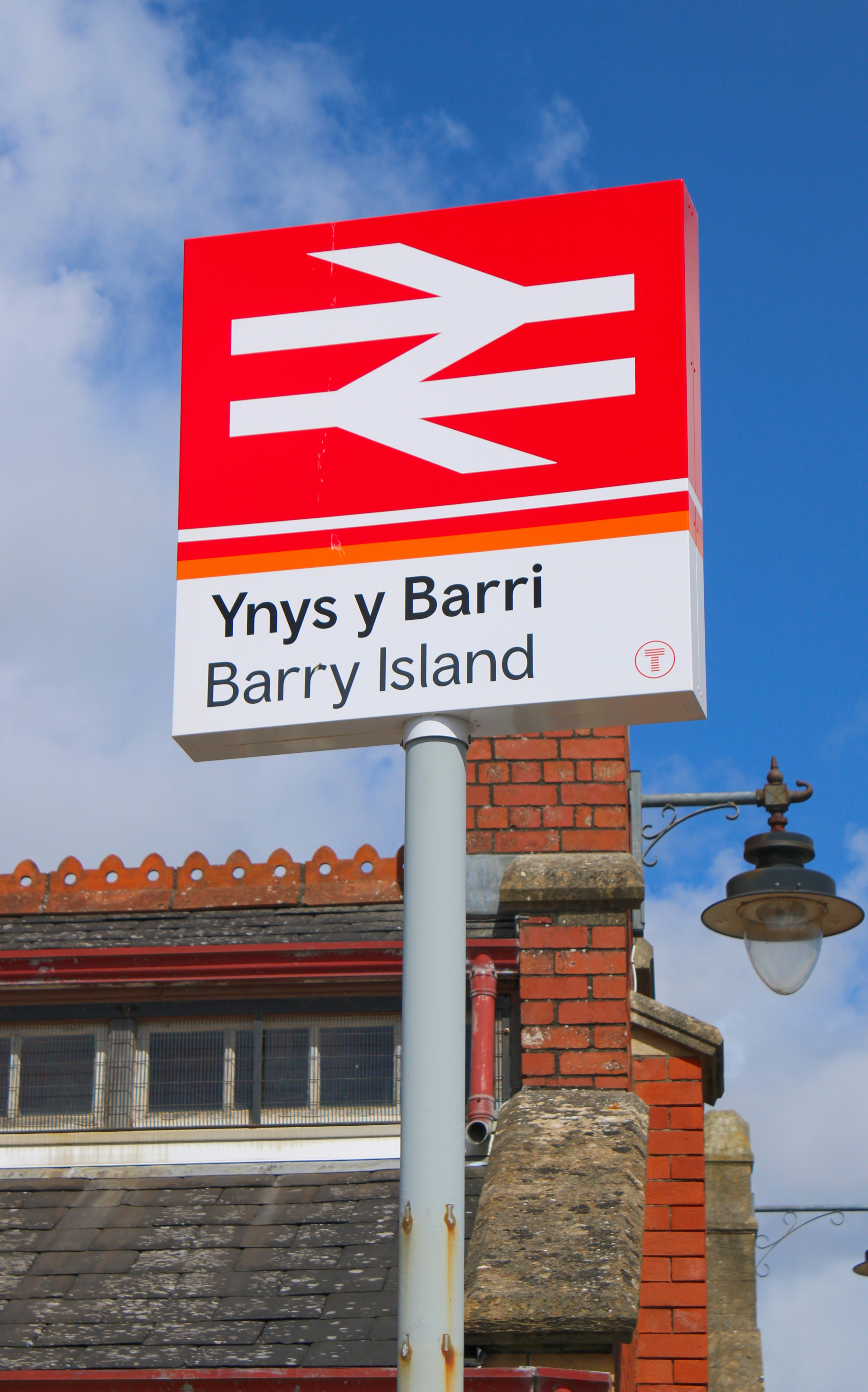 A train station sign for barry island.
