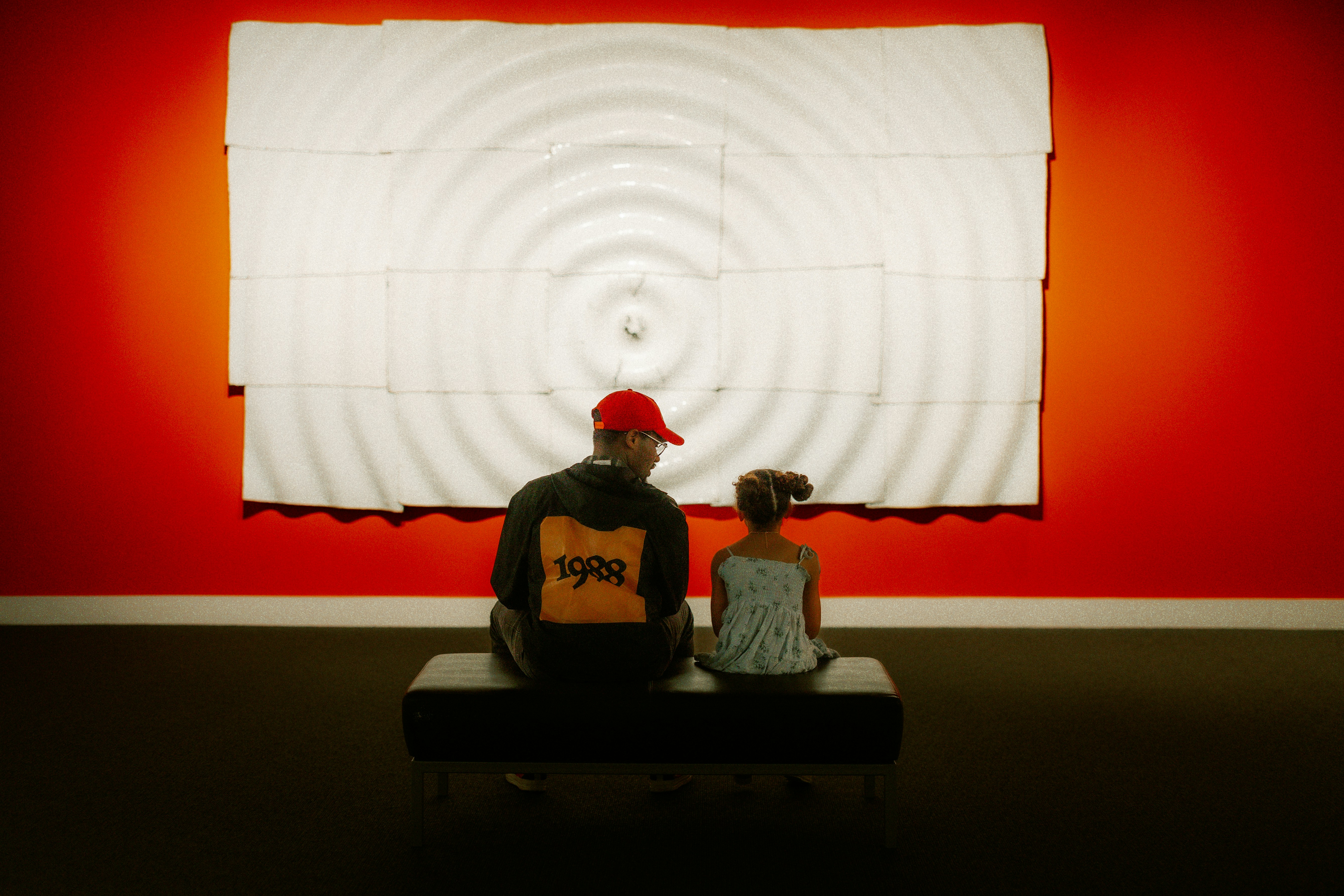 A child and parent exploring an exhibit at a museum - what is home education