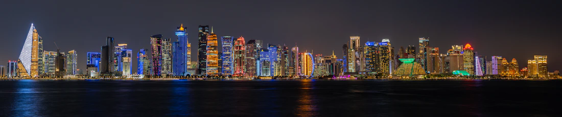 Doha skyline across the water at dusk