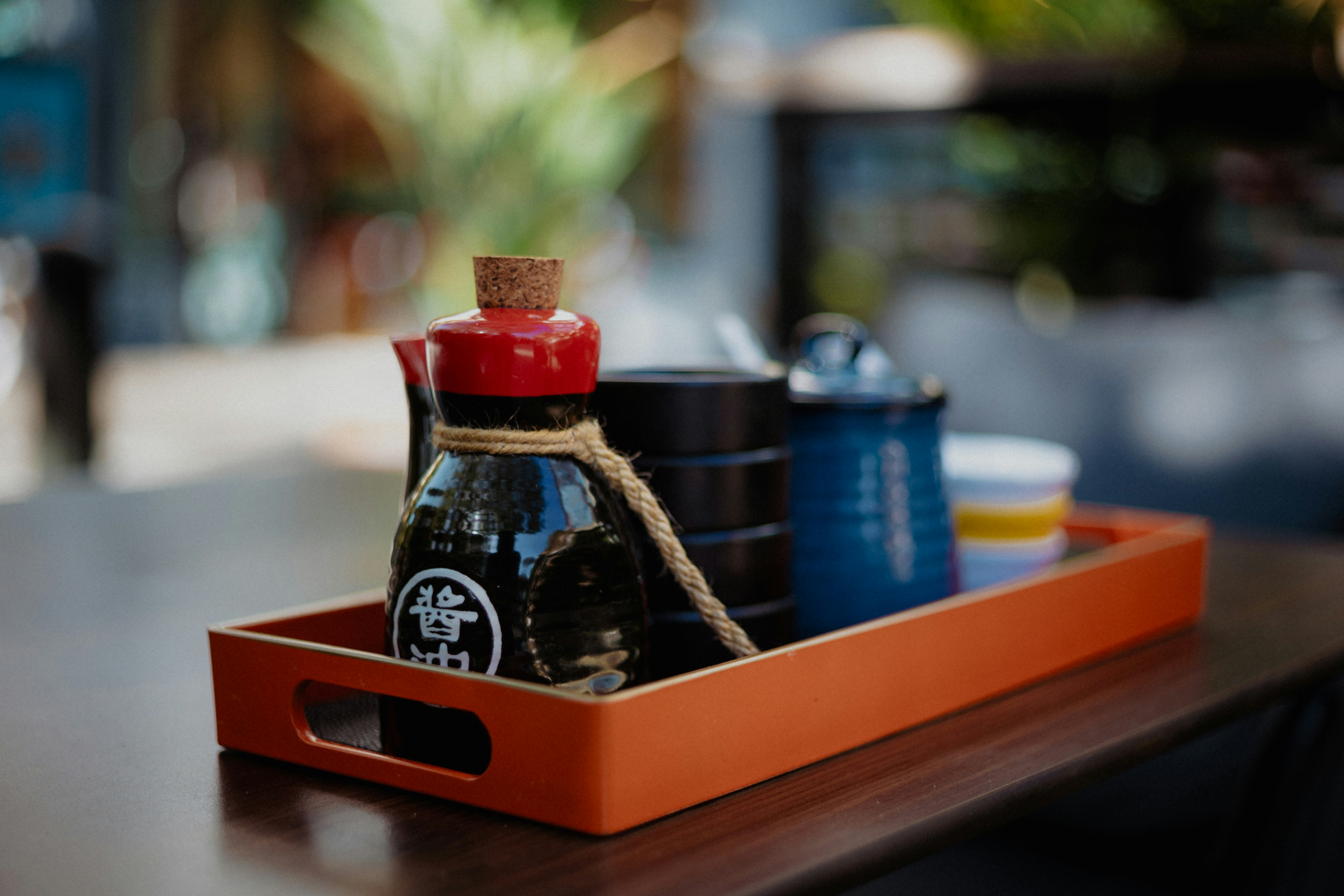 Condiments are neatly arranged on a tray.