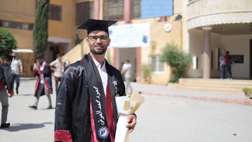 A graduate celebrates his academic achievement.