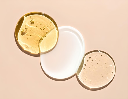 Different serums or lotions are arranged artfully.