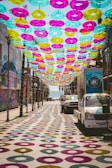 Colorful decorations brighten up a vibrant street.