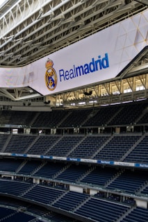 Real madrid's stadium with their logo.