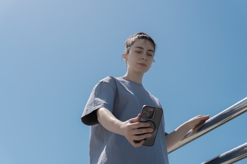 sophisticated woman gazing at coastal cityscape