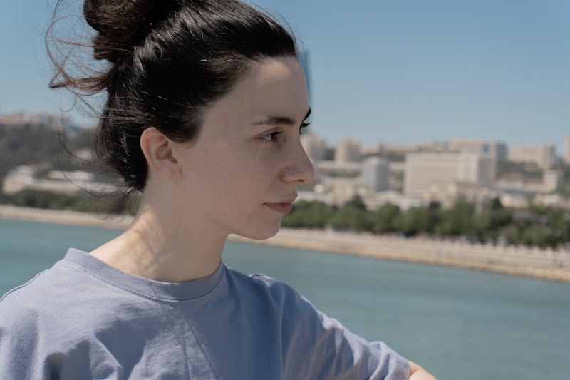 confident Australian woman with city skyline