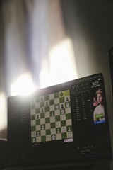 Chess is played on a computer screen.