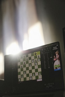 Chess is played on a computer screen.