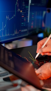 Analyzing stock charts with a stylus.